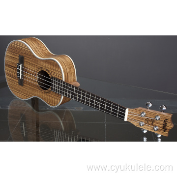 Zebra wood ukulele lettering